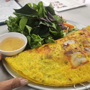 Pho 97 - $19 Banh Xeo - huge, served on a pizza tray. Shareable appetizer & devoured... fed 3 perfectly. - Vietnamese Near Me - Honolulu, Hawaii Pho 97 - $19 Banh Xeo - huge, served on a pizza tray. Shareable appetizer & devoured... fed 3 perfectly. - Vietnamese Near Me - Honolulu, Hawaii