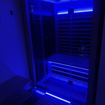 Ocean Ember - The infrared sauna at Ocean Ember with blue chromo therapy lighting for the evening. - Saunas Near Me Ocean Ember - The infrared sauna at Ocean Ember with blue chromo therapy lighting for the evening. - Saunas Near Me