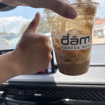 Dam Coffee Bar - the remains of the saigon latte and my boyfriend doing a thumbs up - Coffee & Tea Near Me - Austin, Texas Dam Coffee Bar - the remains of the saigon latte and my boyfriend doing a thumbs up - Coffee & Tea Near Me - Austin, Texas