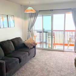 Other side of living area, balcony with great view.