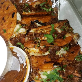 Big Mans Belly - a plate of food with sauce - American Near Me - Indianapolis, Indiana