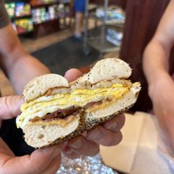 Park Place Bagels - Bacon, egg, cheese and hash brown on a bagel.