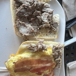 Worst breakfast sandwich ever. It was all bun. My girlfriend added the bacon from her sandwich to help. Worst breakfast sandwich ever. It was all bun. My girlfriend added the bacon from her sandwich to help.