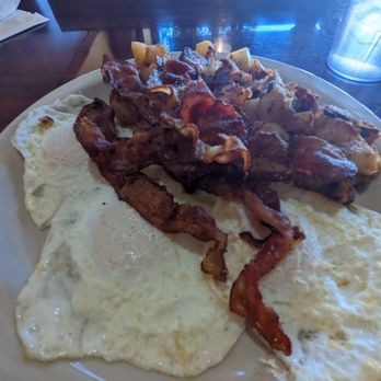 The Golden Grill Restaurant - Eggs over easy with bacon and home fries. - American Near Me - Teaneck, New Jersey The Golden Grill Restaurant - Eggs over easy with bacon and home fries. - American Near Me - Teaneck, New Jersey