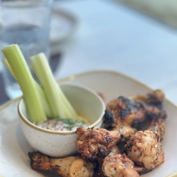 Monkeypod Kitchen - Roasted chicken wings $22  Happy hour half off as of Nov 2023 - Tacos Near Me - Honolulu, Hawaii