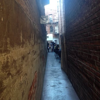 Far Bar - Narrow alley way entrance to side patio, al fresco seating - Asian Fusion Near Me - Los Angeles, California