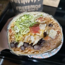 White meat chicken, Spanish rice, black beans, mixed cheese, lettuce & tomato. My classic go-to White meat chicken, Spanish rice, black beans, mixed cheese, lettuce & tomato. My classic go-to