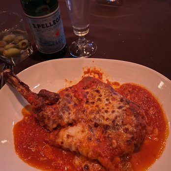 Piero's Italian Cuisine - The Perfect Veal Parmesan--this is half a full order btw! - Italian Near Me - Las Vegas, Nevada Piero's Italian Cuisine - The Perfect Veal Parmesan--this is half a full order btw! - Italian Near Me - Las Vegas, Nevada