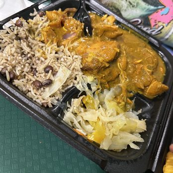 Irie Jamaican Cuisine - Curry Chicken Steamed Cabbage Rice and Bean Side - Caribbean Near Me - Chattanooga, Tennessee Irie Jamaican Cuisine - Curry Chicken Steamed Cabbage Rice and Bean Side - Caribbean Near Me - Chattanooga, Tennessee
