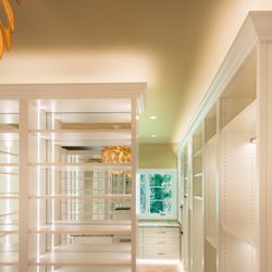 Kartak Glass & Closet - Giant Walk-In Closet with built-in lights throughout