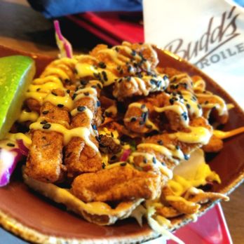 Budd's Broiler - Calamari bites over a sweet chili slaw. Very Tasty! - Steakhouses Near Me - Richland, Washington Budd's Broiler - Calamari bites over a sweet chili slaw. Very Tasty! - Steakhouses Near Me - Richland, Washington