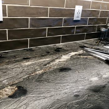 Two Stone Slab & Tile - Kitchen granite highlighted with subway tile. - Flooring Near Me - Minden, Nevada