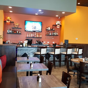 Wild Ginger Asian Bistro - Far pic of the bar and other half the dining room - Asian Fusion Near Me - Gilbert, Arizona Wild Ginger Asian Bistro - Far pic of the bar and other half the dining room - Asian Fusion Near Me - Gilbert, Arizona