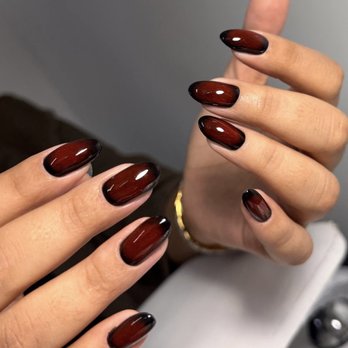 M. STUDIO - Deep red cat eye nails for Halloween Russian manicure with a dark magnetic finish at M. STUDIO in Midtown Manhattan, NYC. - Nail Salons Near Me - New York, New York M. STUDIO - Deep red cat eye nails for Halloween Russian manicure with a dark magnetic finish at M. STUDIO in Midtown Manhattan, NYC. - Nail Salons Near Me - New York, New York
