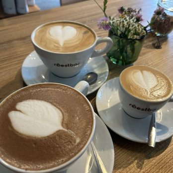 Roestbar - From top clockwise: flat white, espresso, and hot chocolate - Desserts Near Me - Münster, NW Roestbar - From top clockwise: flat white, espresso, and hot chocolate - Desserts Near Me - Münster, NW