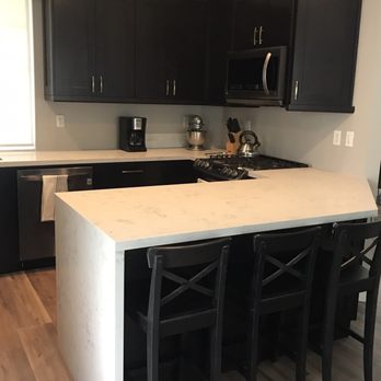 Ikon Builders - Waterfall peninsula with eat in breakfast bar - Damage Restoration Near Me - San Juan Capistrano, California