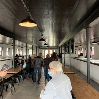 Flying Ace Farm - people in a cafeteria area - Breweries Near Me - Lovettsville, Virginia
