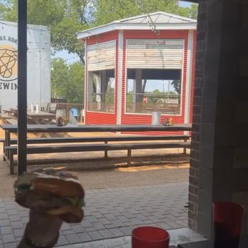 Twisted Root Burger - Looking out to more outdoor seating - American Near Me - Mansfield, Texas Twisted Root Burger - Looking out to more outdoor seating - American Near Me - Mansfield, Texas