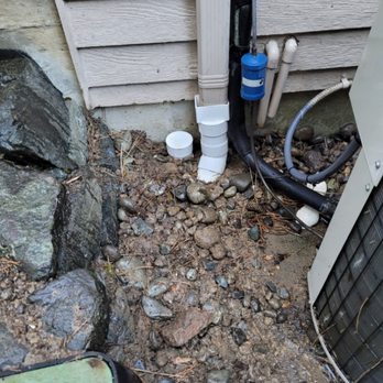 Stay Dry Construction Services - Installed downspout drainage with downspout adapters with clean outs and vent well drains - Foundation Repair Near Me Stay Dry Construction Services - Installed downspout drainage with downspout adapters with clean outs and vent well drains - Foundation Repair Near Me