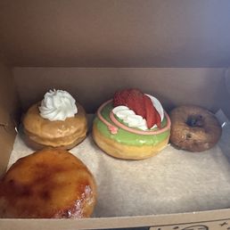 Doughnuts that made it home - the gluten free one in top left