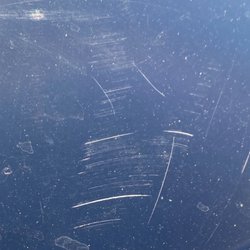 Shell - This is one of the many scratches it has, it's literally clear that it's a brush mark, and the manger was trying to say it wasn't.