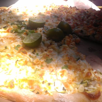 Cheese Board Pizza - Fresh California corn, chile passilla, onions, mozzarella and French feta cheese, garlic olive oil, cilantro, limes - Pizza Near Me - Berkeley, California