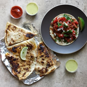 Grandotes Taco Grill - Chicken Taco and Chicken Quesadilla...super delicious. - Food Trucks Near Me - Raleigh, North Carolina Grandotes Taco Grill - Chicken Taco and Chicken Quesadilla...super delicious. - Food Trucks Near Me - Raleigh, North Carolina