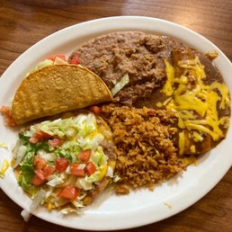 It's their #22..enchilada, taco, tostada refried beans and Spanish rice..yummy It's their #22..enchilada, taco, tostada refried beans and Spanish rice..yummy