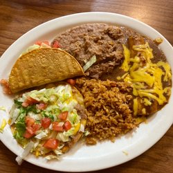 Mi Casa Cafe - It's their #22..enchilada, taco, tostada refried beans and Spanish rice..yummy