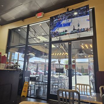 Twisted Sourdough Pizza - TV above the entrance - Pizza Near Me - Las Vegas, Nevada Twisted Sourdough Pizza - TV above the entrance - Pizza Near Me - Las Vegas, Nevada