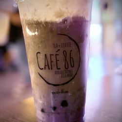 Ube milk tea with lychee and boba.