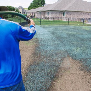 Mighty Green Hydromulch - a man using a hose to water a baseball field - Landscaping Near Me - Fort Worth, Texas Mighty Green Hydromulch - a man using a hose to water a baseball field - Landscaping Near Me - Fort Worth, Texas