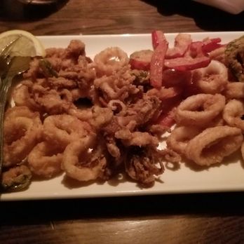 The Keg Steakhouse + Bar - Moncton - Crispy and spicy calamari appetizer with a side of house sauces - Steakhouses Near Me - Moncton, New Brunswick