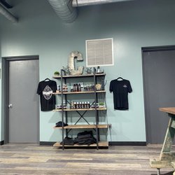 C&C Barbershop - Hair products and shirts for sale