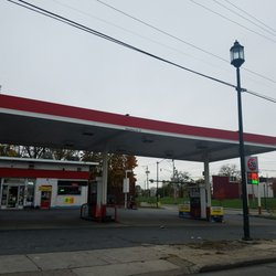 76 Gas Station - 76 was a good year. Not that I.... er.. remember it....... (inches towards door) (emphasis on inches)