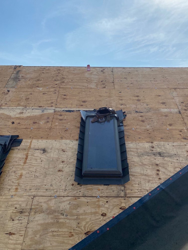 Slide of Ik Roofing & Reconstruccion