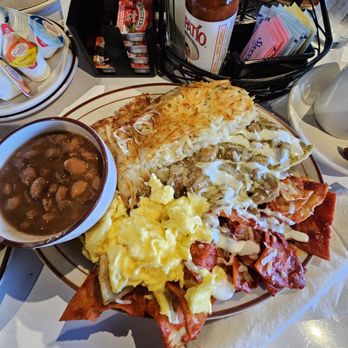 Old River Grill at Brimhall Square - Chilaquiles red & green sauce, chilies Verde, hash browns, scrambled eggs and beans. - Breakfast & Brunch Near Me - Bakersfield, California Old River Grill at Brimhall Square - Chilaquiles red & green sauce, chilies Verde, hash browns, scrambled eggs and beans. - Breakfast & Brunch Near Me - Bakersfield, California