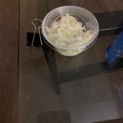 Literally one tablespoon of slaw. not worth the price. Yes, I'm pissed! I also purchased shrimp that was hard as a rock!!! What a rip off.