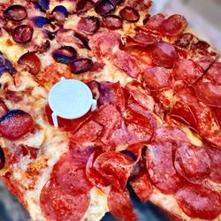 Salvatore's Old Fashioned Pizzeria - Half char pepperoni half regular. I didn't ask for extra pepperoni...I think it comes this way.