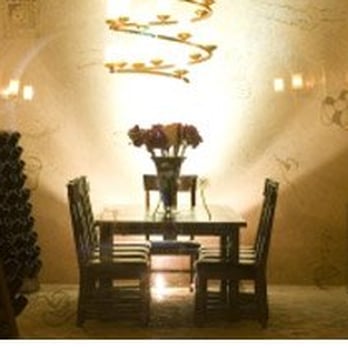 Karma Vineyards - The wine cellar with an event room in the center. - Wineries Near Me - Chelan, Washington Karma Vineyards - The wine cellar with an event room in the center. - Wineries Near Me - Chelan, Washington