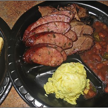 The Brisket House - Yum, yum.  Brisket, jalapeño sausage and potato salad.  All good. - Barbeque Near Me - Deer Park, Texas