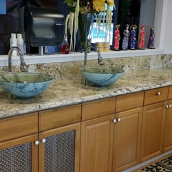 TLC Nail Spa - New granite countertop , kohler faucets and glass bowls.
