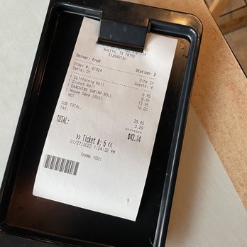 Goya Sushi & Grill - receipt on a tray - Japanese Near Me - Austin, Texas Goya Sushi & Grill - receipt on a tray - Japanese Near Me - Austin, Texas
