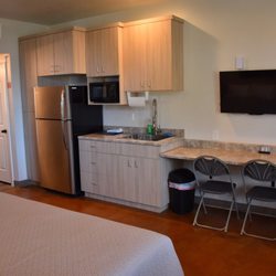 Zion's Camp and Cottages - Spacious rooms with a king bed and bunkbeds with a  nice kitchenette.  This is in one of the bunkhouses.