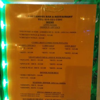 S.S 2 Famous Bar & Restaurant - Menu on the outside of the shop - Caribbean Near Me - Toronto, Ontario S.S 2 Famous Bar & Restaurant - Menu on the outside of the shop - Caribbean Near Me - Toronto, Ontario