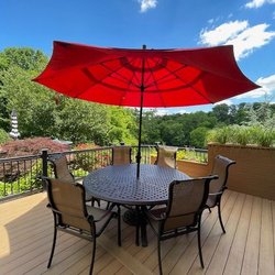 Riehl Brothers Builders - Built in planters are part of the railing system.