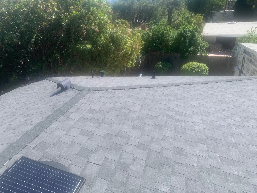 Slide of K & H Roofing