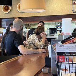 Ruby Tuesday - Store manager and staff at the bar with customers in the room. Close this house and sell to a company that wants customers.