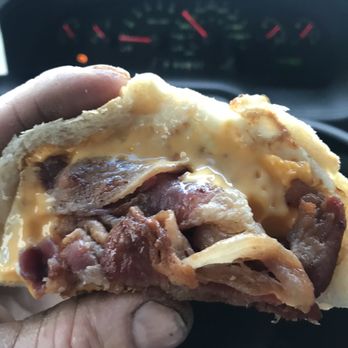 Bagel Station Deli - a hand holding a sandwich - Delis Near Me - Port Jervis, New York