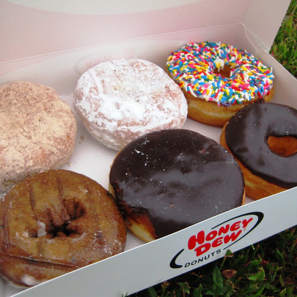 a variety of donuts in a box